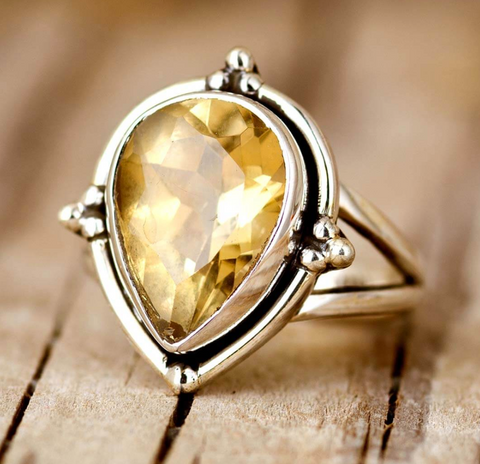genuine authentic citrine gemstone set in a sterling silver ring for women and citrine attracts prosperity available at boho magic