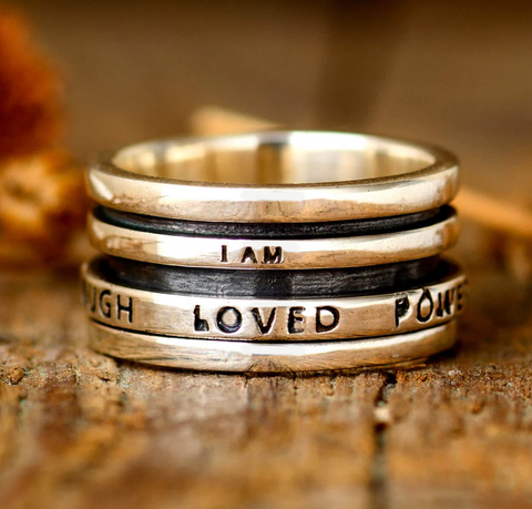 sterling silver empowering spinner ring with mantras and affirmations for women available at boho magic